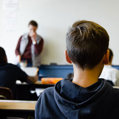 Student listening to teacher